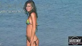 Jessica's hot bikini dance on the beach is pure fire! 🔥