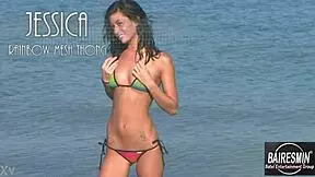 Jessica's hot bikini dance on the beach is pure fire! 🔥