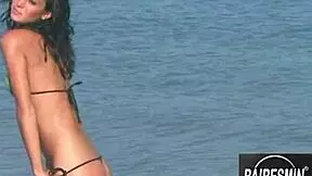 Jessica's hot bikini dance on the beach is pure fire! 🔥