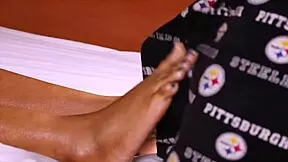 Pretty young girl gives awesome footjob with bare feet