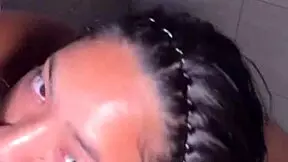 Cute brunette blows BBC in bathroom.