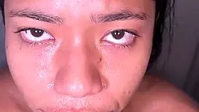 Cute brunette blows BBC in bathroom.