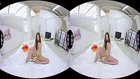 bow-tie naked sweetie masturbates with dildo