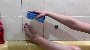 Look at this naked girl bathing with soapy foam all over her body