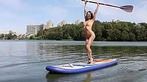 Petite shaved teen explores her nude body on the naked beach