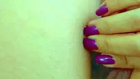 Desi beauty masturbates with glass dildo in close-up, her hairless pussy glistening