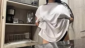 juicy masturbation in the hotel kitchen with big natural tits
