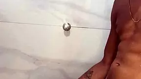 fucking a big-ass brunette in the bathroom ends with cum on her face