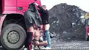 petite blonde hottie gets fucked in a public threesome by two guys at the construction site. she sucks cocks and gets her pussy pounded outdoors