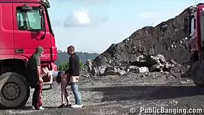 petite blonde hottie gets fucked in a public threesome by two guys at the construction site. she sucks cocks and gets her pussy pounded outdoors