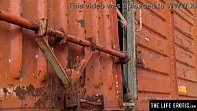 Adventurous brunette masturbates with toys in railroad car