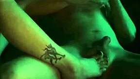 Goth teen gives oiled footjob to stepbrother