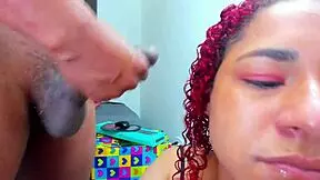 A petite teen deepthroats a big black cock for cumshot