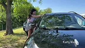 hey, why's this crazy girl peeing on car roof?