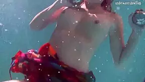 Redhead Nikita Vodorezova, why get naked so fast underwater?
