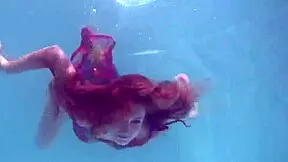 Redhead Nikita Vodorezova, why get naked so fast underwater?