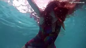 Redhead Nikita Vodorezova, why get naked so fast underwater?