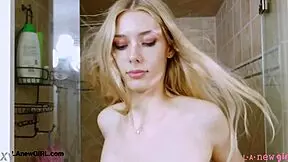 Elegant shy blonde took a shower