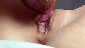 Wet pussy licked to orgasm in close-up view.