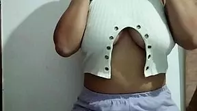 Milf massages her big tits with pleasure in homemade video?