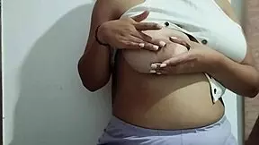 Milf massages her big tits with pleasure in homemade video?