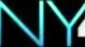 A tiny tease struggles to grip a 10-inch object during a playful session.