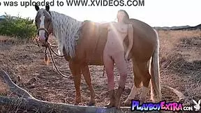 Petite Redhead Odette Fox With Big Natural Tits Strips To Show Pussy On Horseback.