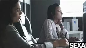 two girls in lingerie enjoy office time together