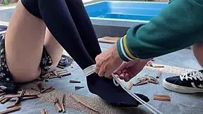 hottie in stockings tied and tickled outdoors