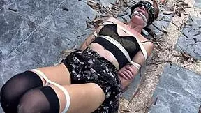 hottie in stockings tied and tickled outdoors