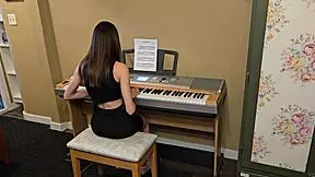 Homemade piano lesson with petite teen student