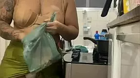 hey, check this chick flashing her swollen pussy in a mini skirt during a kitchen live stream