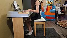 Homemade piano lesson with petite teen student