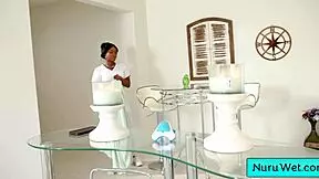 Ebony masseuse rubs clit in shower