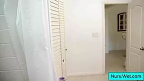 Ebony masseuse rubs clit in shower