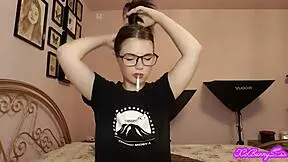 Hot brunette Romanian smoking wearing glasses