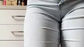 Homemade video of petite 18+ blonde girlfriend undressing and dancing in tight jeans, ripping clothes for assplay