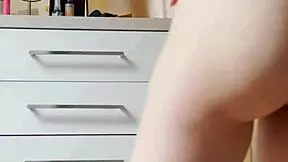 Homemade video of petite 18+ blonde girlfriend undressing and dancing in tight jeans, ripping clothes for assplay