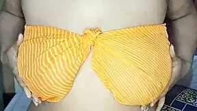 in a quiet village, a curvy desi housewife with natural charm shares her daily life through homemade clips