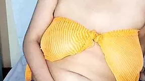 in a quiet village, a curvy desi housewife with natural charm shares her daily life through homemade clips