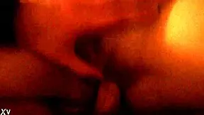 Young Latina appears in a simple homemade amateur video.