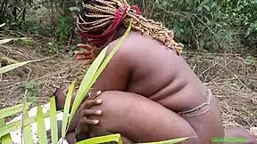 BBW with big tits gets doggystyle in bush, cum close up