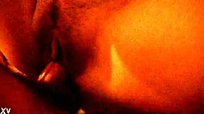 Young Latina appears in a simple homemade amateur video.