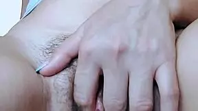 Solo girl enjoys a relaxing masturbation session.