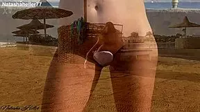 No panties on the public beach, sexy young girl!