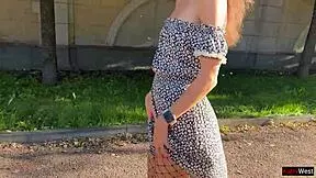 Woman flashes in public with pantyhose.