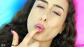 mesmerizing brunette beauty shows her stunning body during a photoshoot on the sofa