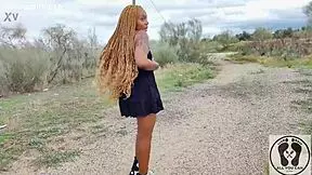 ebony woman walks upskirt in sneakers converse revealing big natural assets
