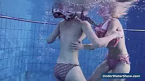 Horny girls strip each other in the pool, don't they?