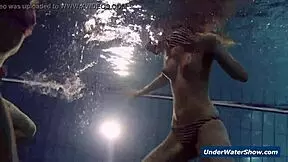 Horny girls strip each other in the pool, don't they?